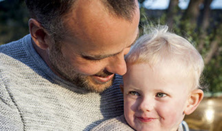 father-and-child-smiling