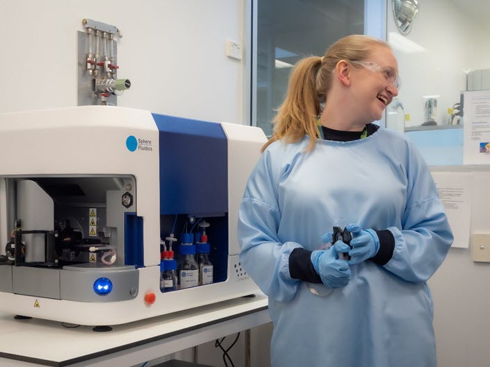 woman-smiling-in-a-lab