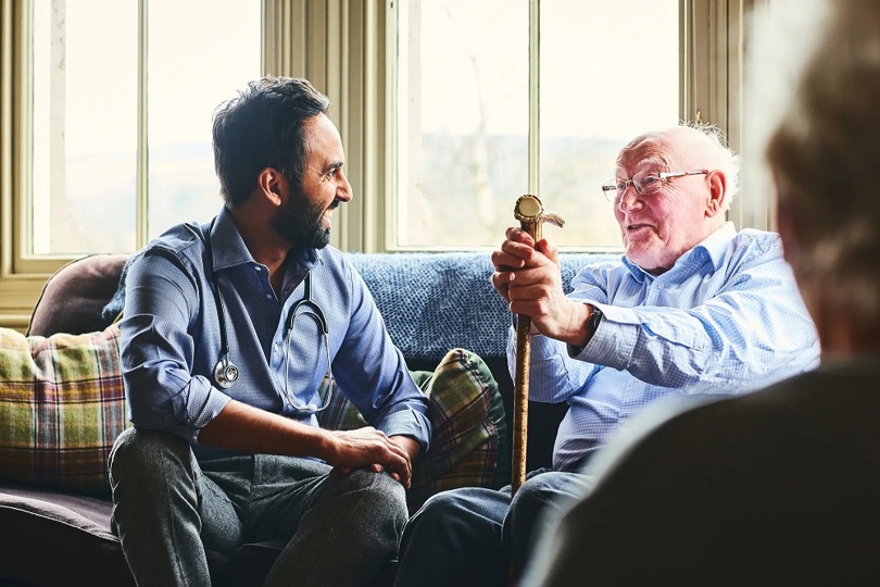 doctor and old man talking