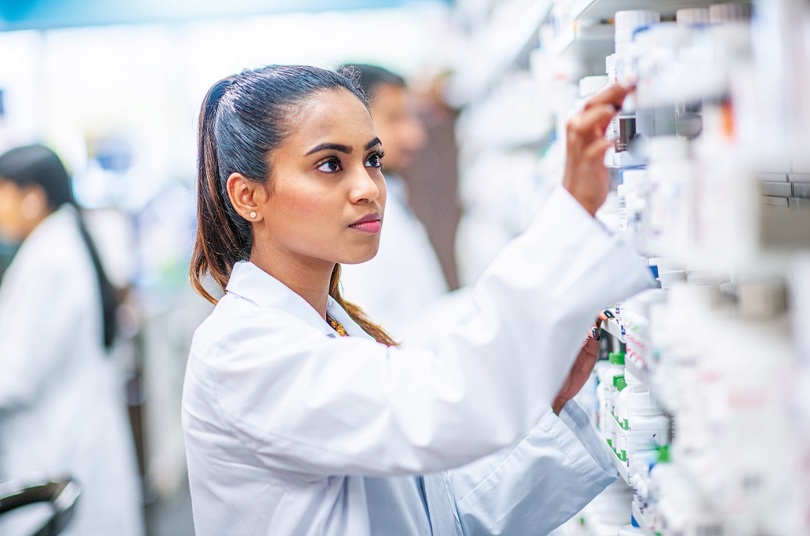 pharmacist sorting medicines