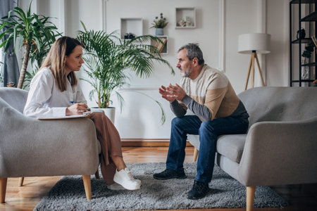A man talking to his therapist about his experiences with psychosis 