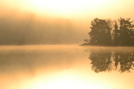 A misty lake symbolising the legends of heroes with migraine throughout the ages