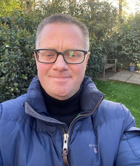 Tim in his garden, smiling and positive after a visualization session. Photo provided by Tim Wotton.