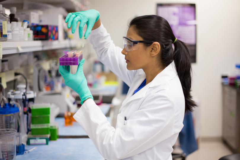 Woman in lab doing tests
