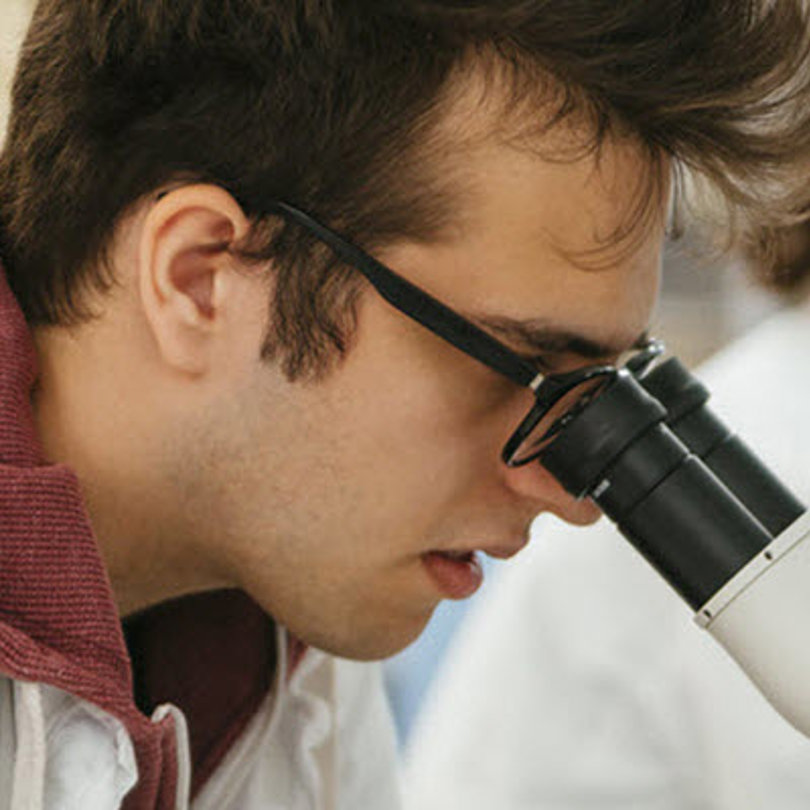 scientist-using-microscope